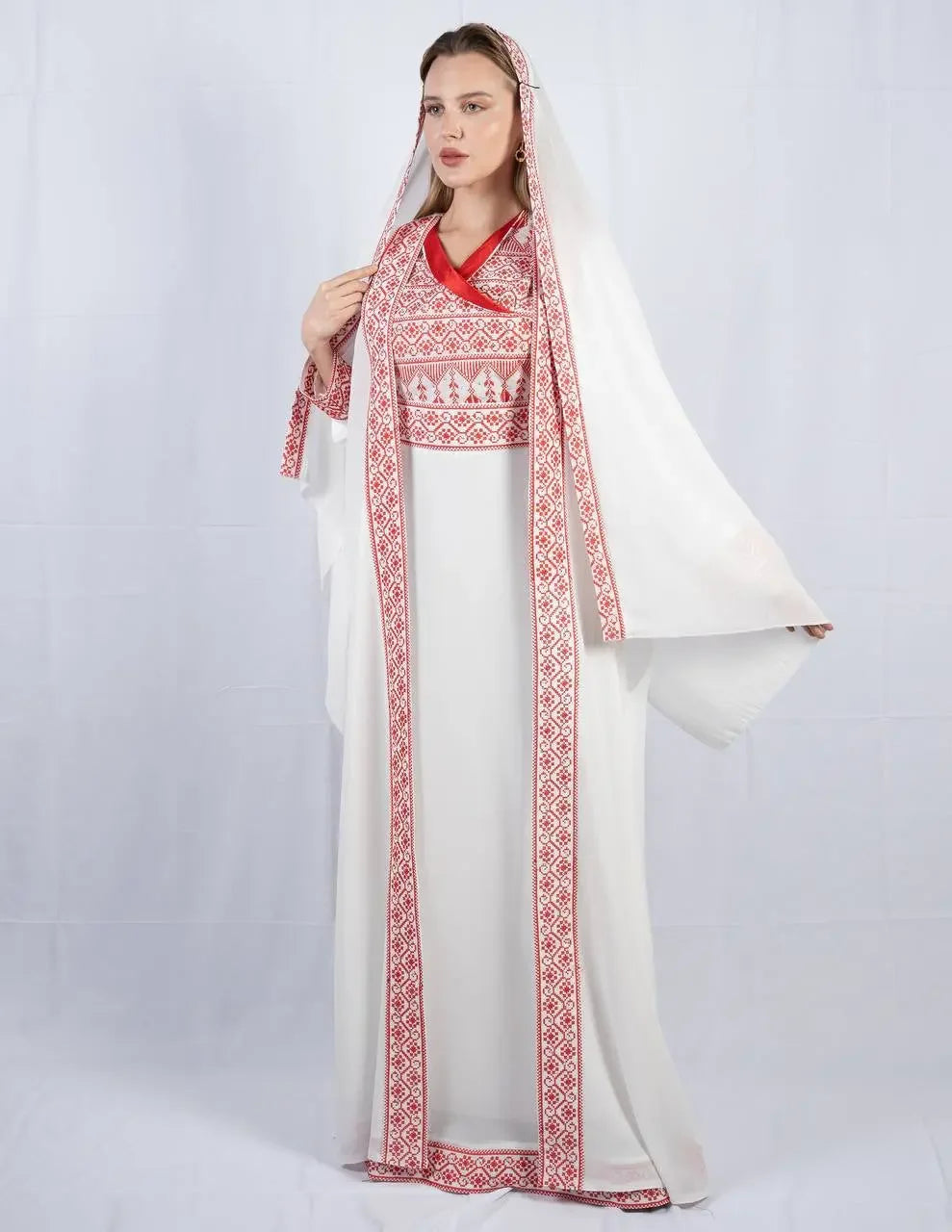 Palestinian Elegance embroidered four piece kaftan set in white with red traditional embroidery and hooded design