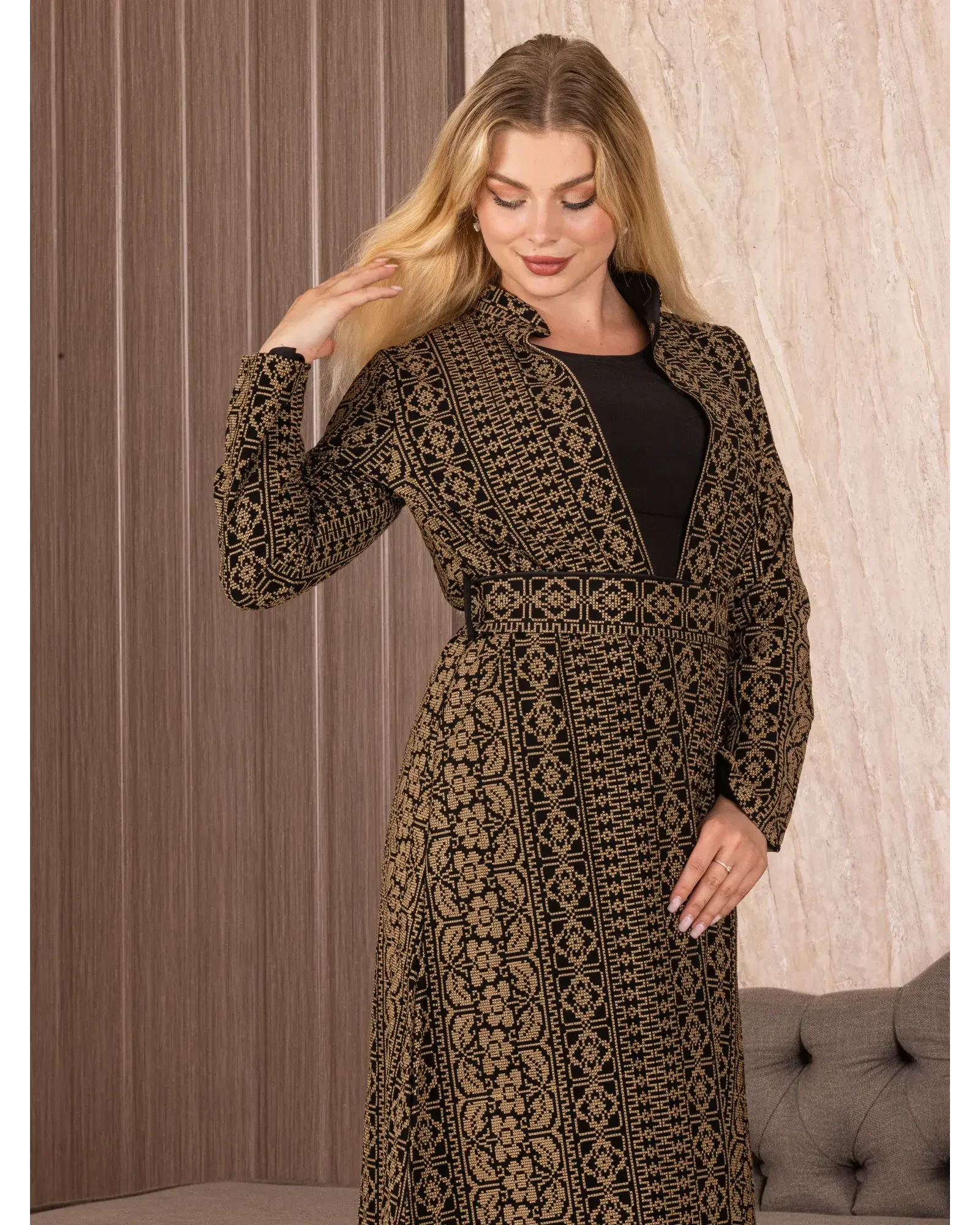 Palestinian Elegance embroidered long cardigan with intricate black and gold traditional patterns