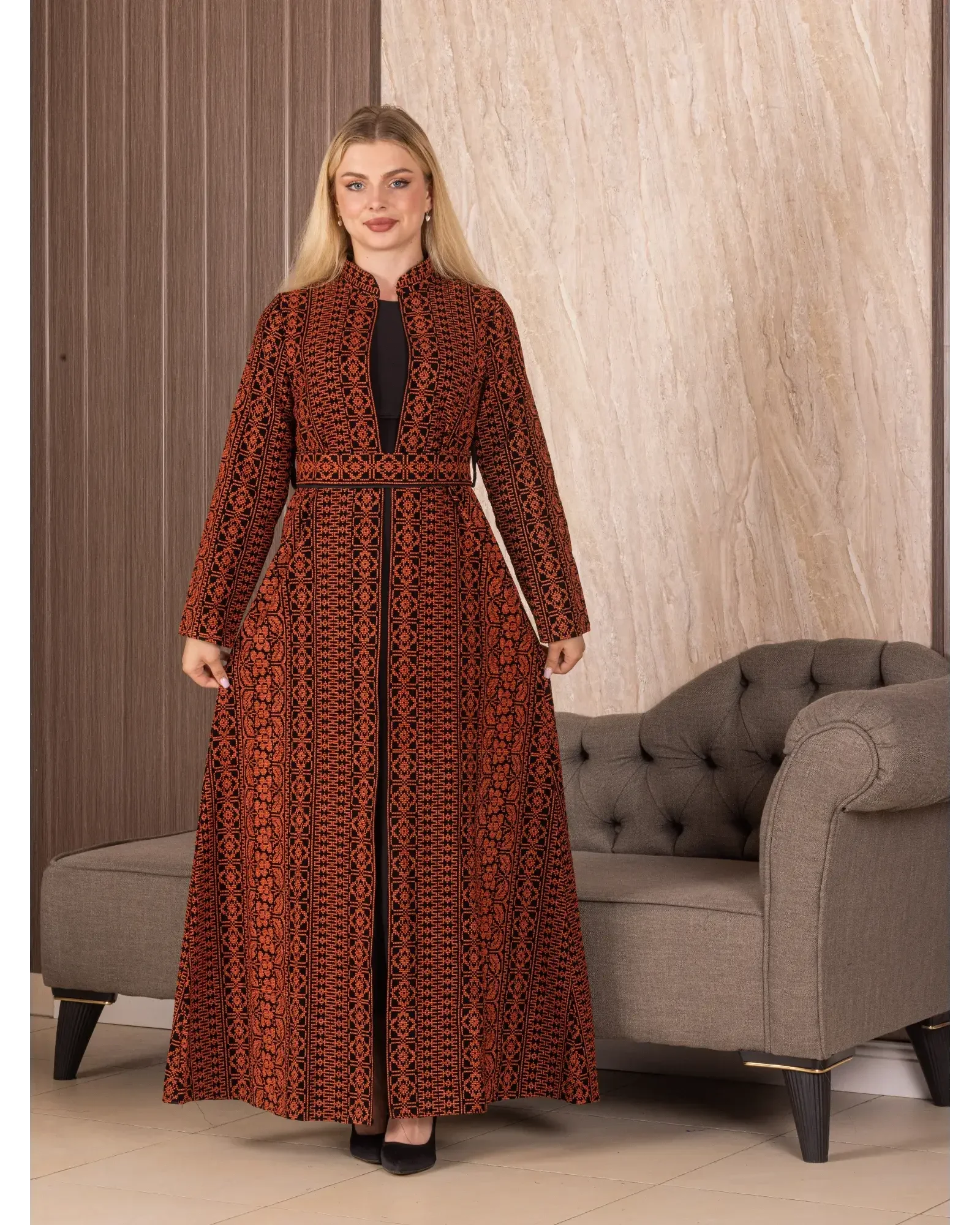 Palestinian Elegance embroidered long cardigan in deep red with intricate black embroidery and belted waist