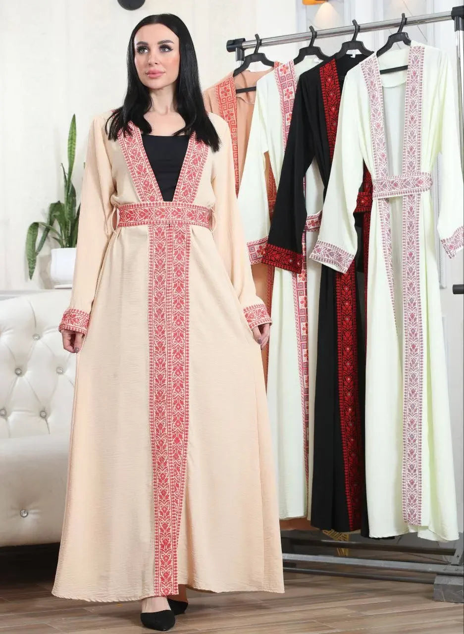 Palestinian Elegance embroidered open cardigan in beige with red traditional patterns on a model