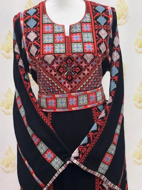 Black embroidered Palestinian Elegance thoub with red, blue, and green intricate traditional patterns