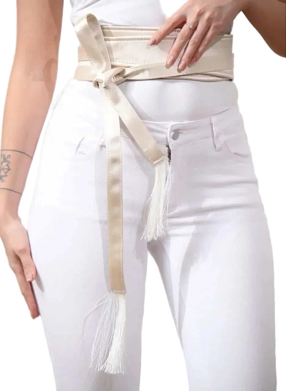 Palestinian Elegance embroidered satin belt in beige wrapped around waist with decorative white tassels