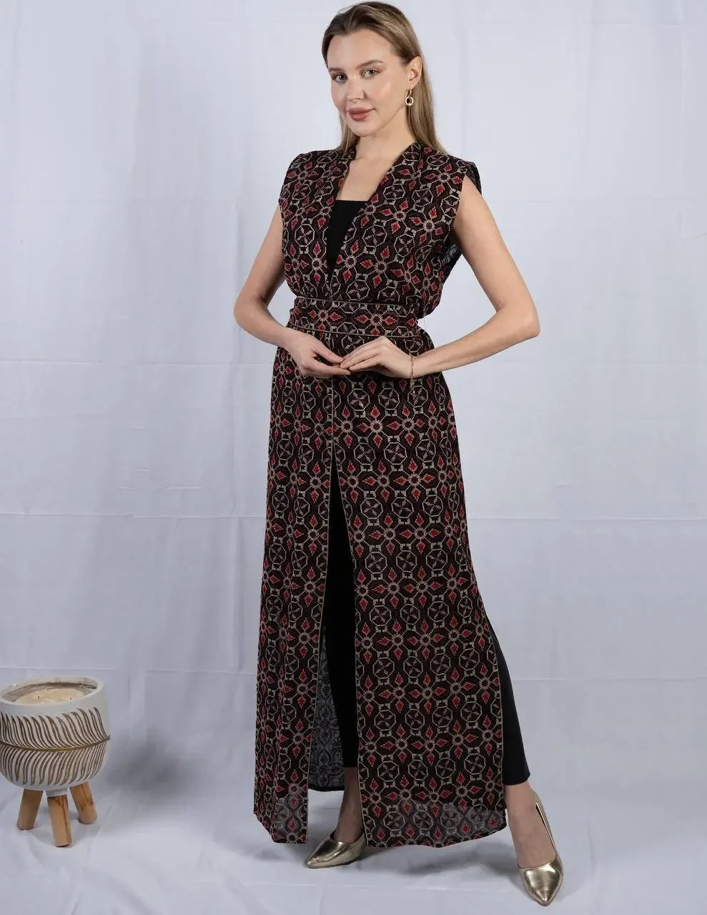 Palestinian Elegance embroidered sleeveless cardigan with intricate casual pattern worn by woman