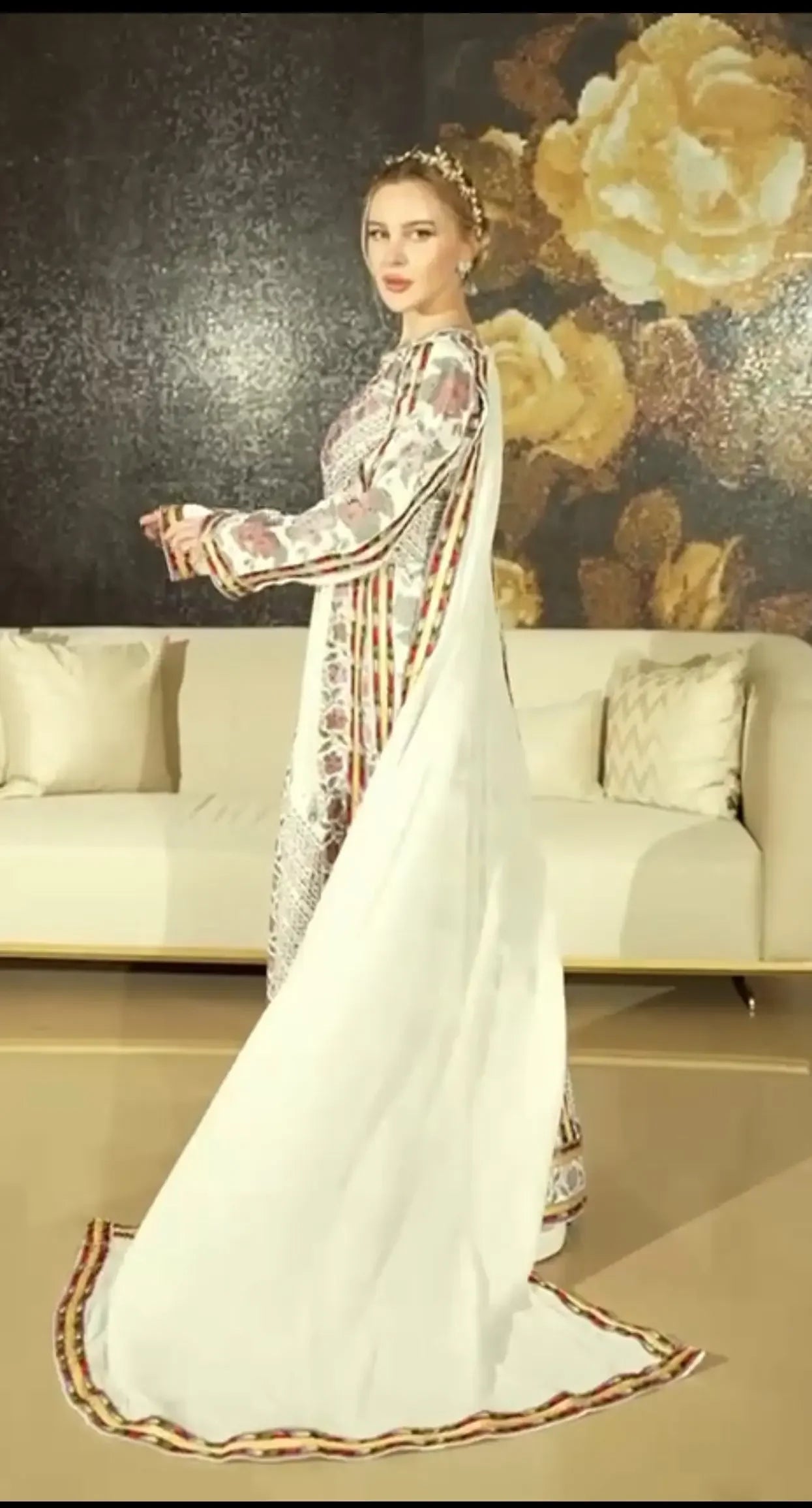 Palestinian Elegance embroidered thoub dress with detailed embroidery and long white trailing fabric