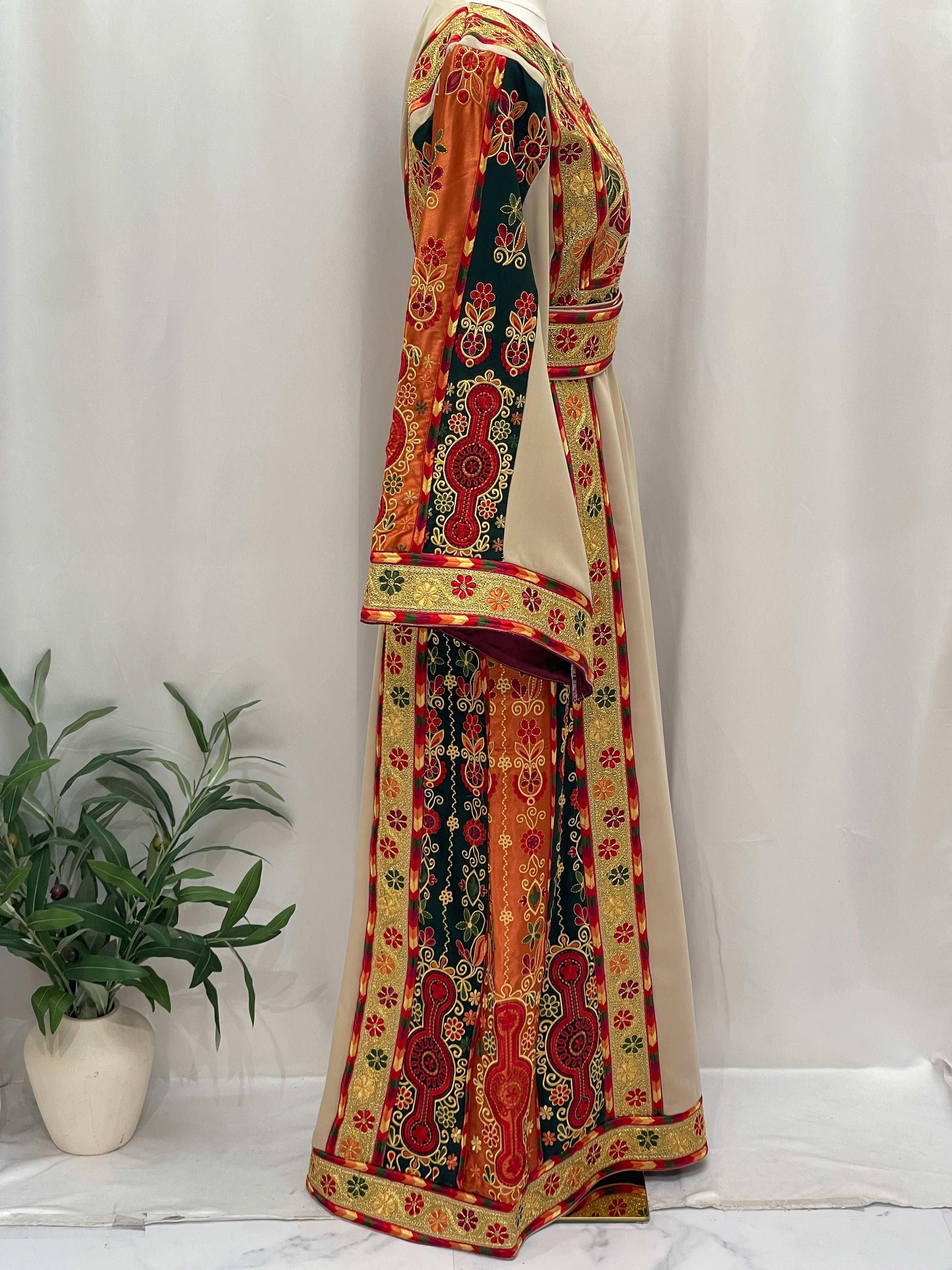 Embroidered Falsteen Kasab Malaka traditional dress with intricate red, orange, and black patterns by Palestinian Elegance