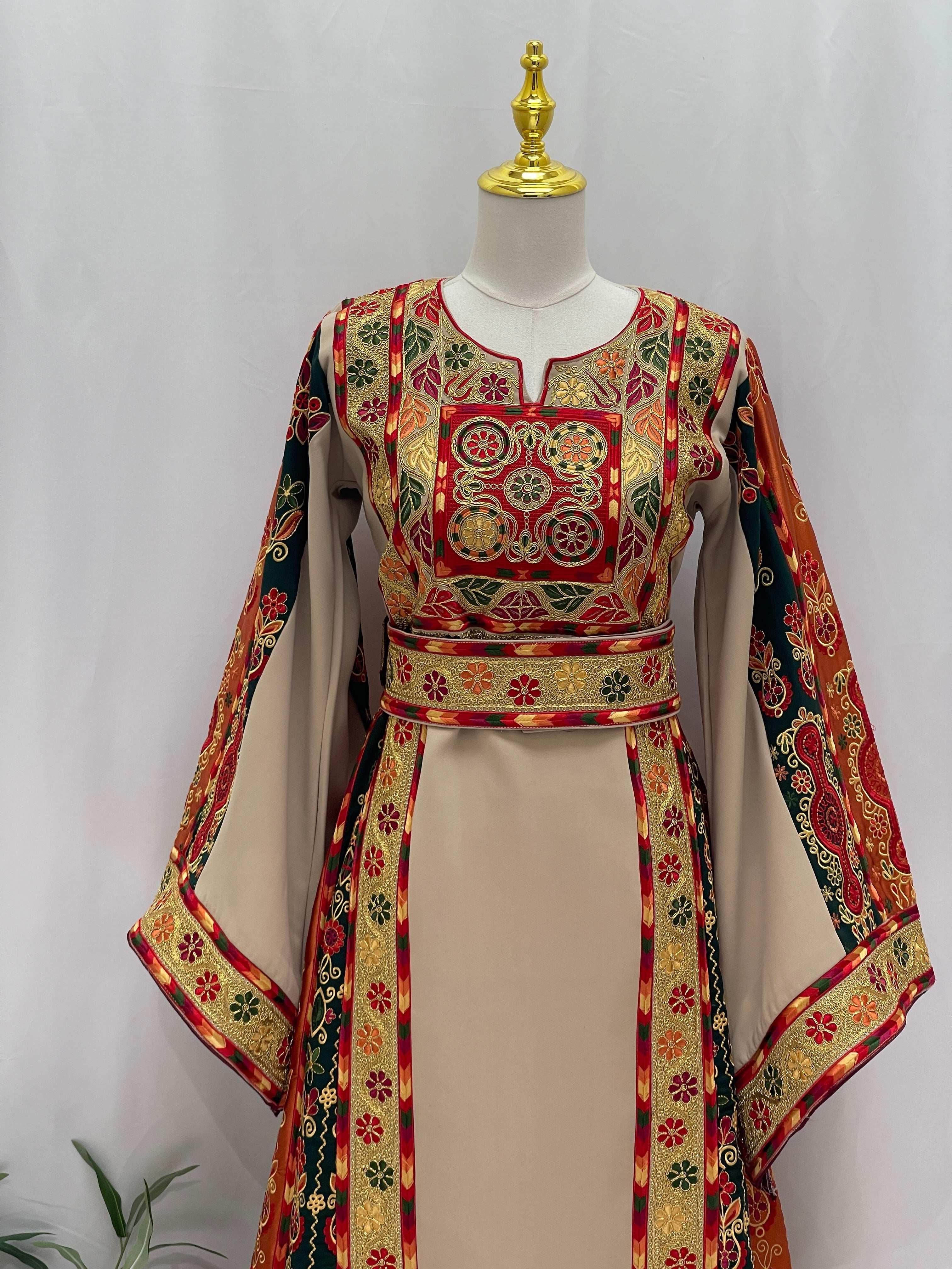 Embroidered Falsteen Kasab Malaka traditional Middle Eastern dress by Palestinian Elegance with intricate red and gold patterns