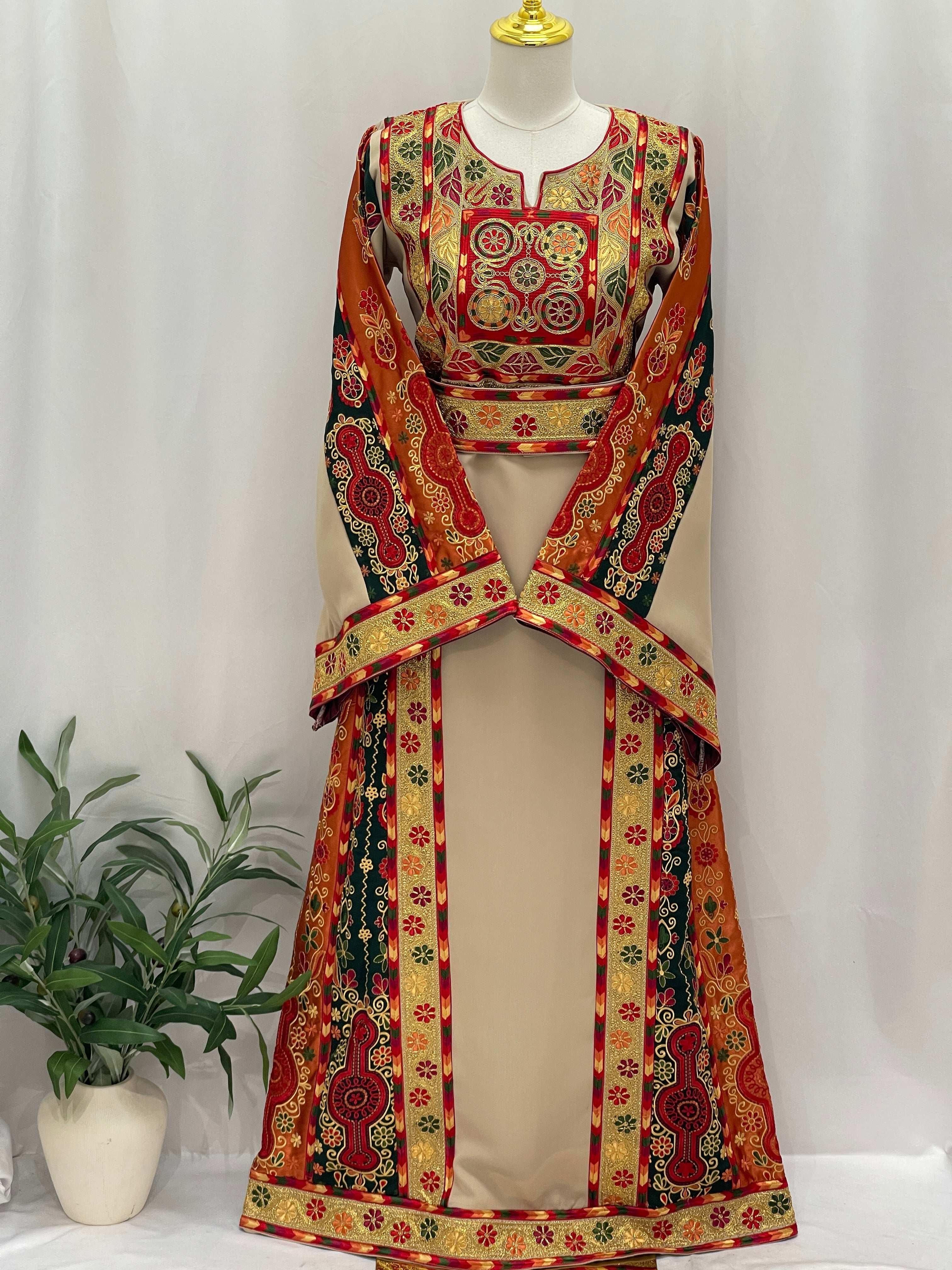 Palestinian Elegance embroidered Falsteen Kasab Malaka dress with intricate red and gold patterns on beige fabric