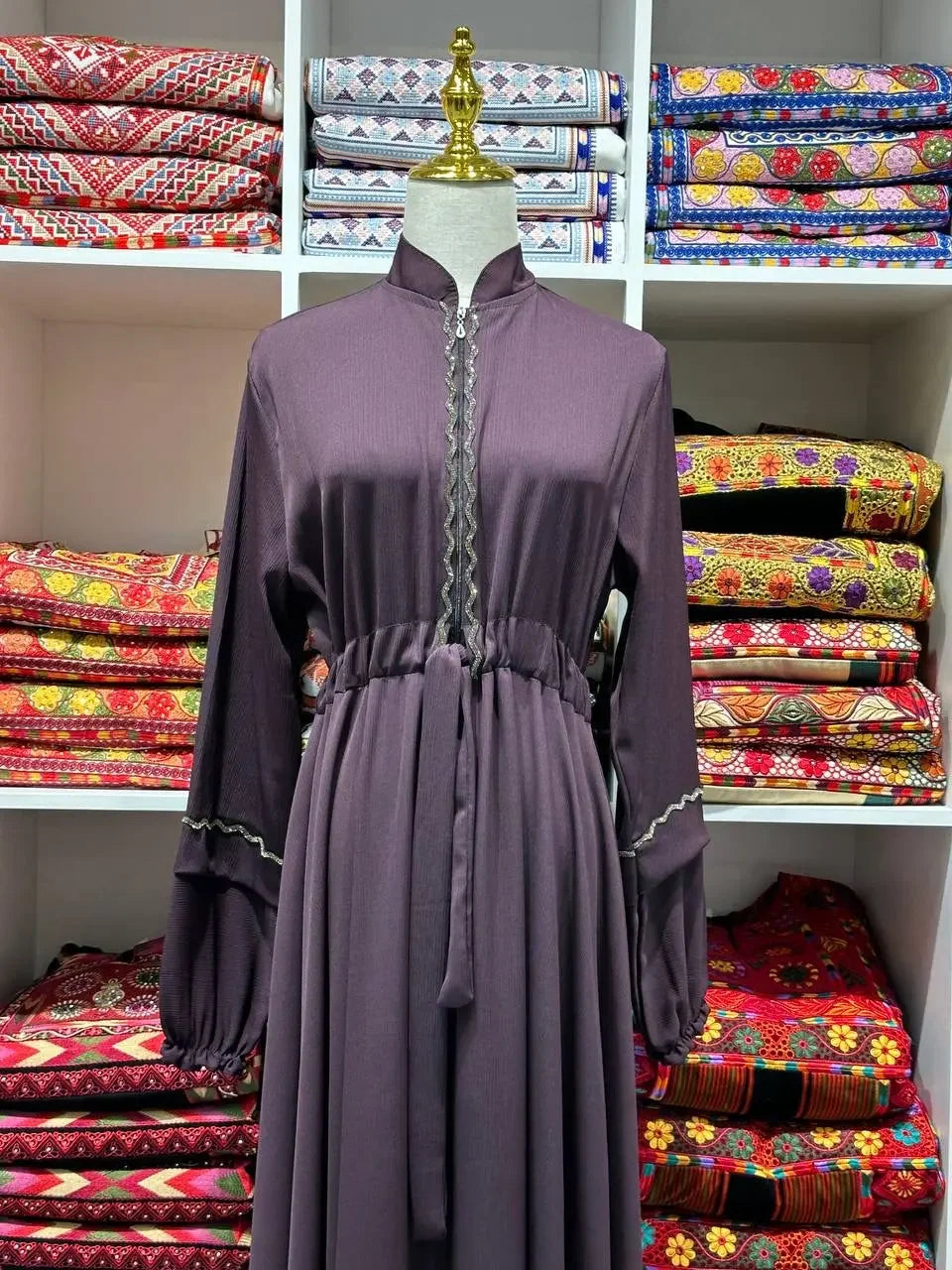 Palestinian Elegance purple fancy abaya dress for women with waist tie and detailed sleeve accents