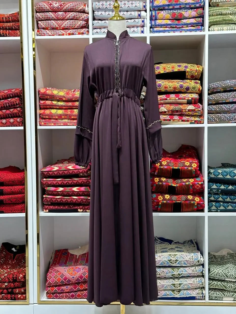 Palestinian Elegance fancy abaya dress for women in deep purple with elegant embroidery detailing