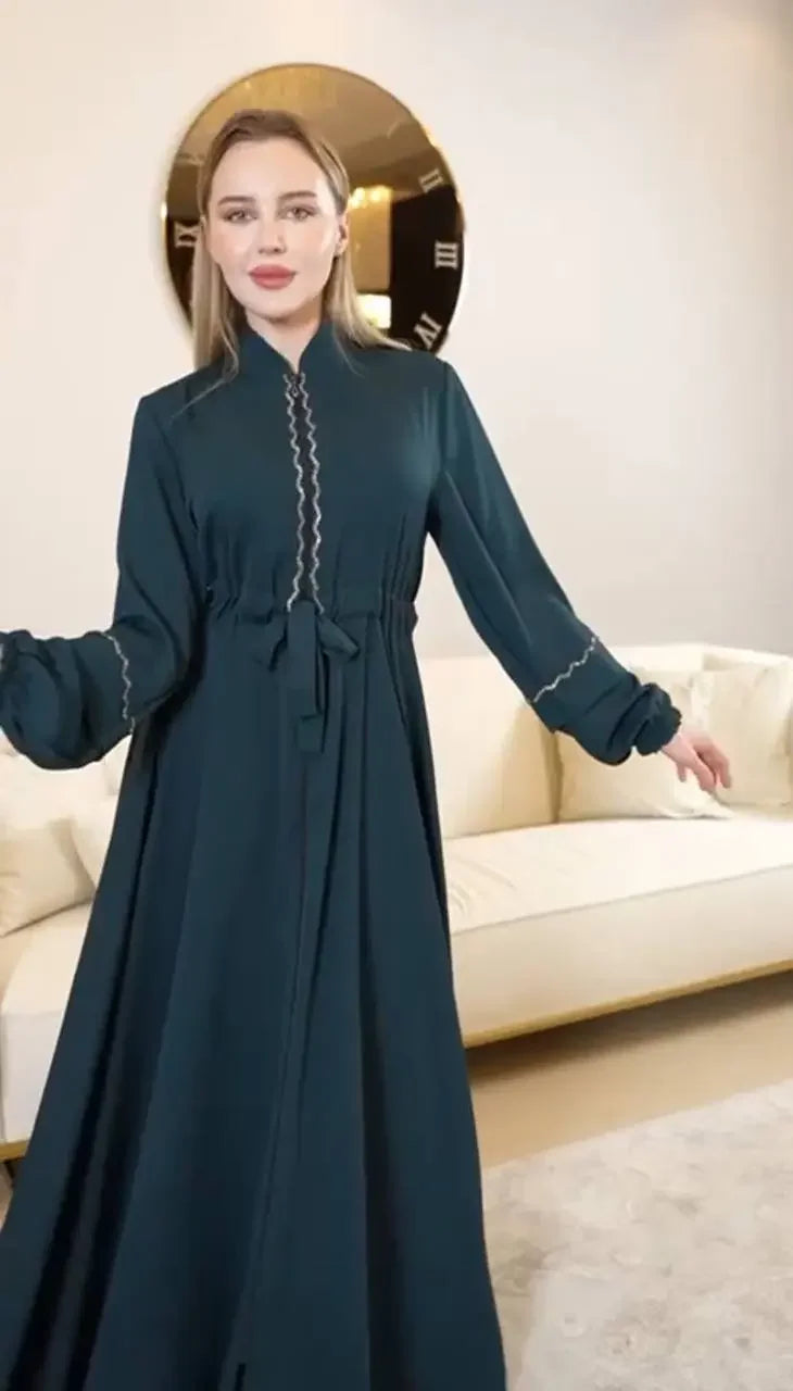 Palestinian Elegance fancy abaya dress for women in dark teal with long sleeves and waist tie