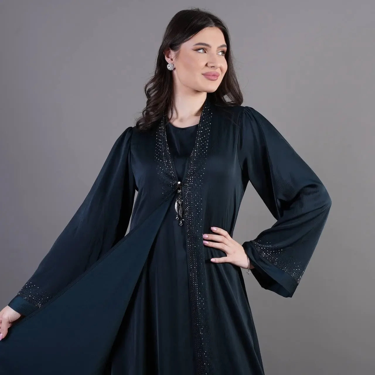 Palestinian Elegance black fancy abaya for occasions with long sleeves and subtle embellishments