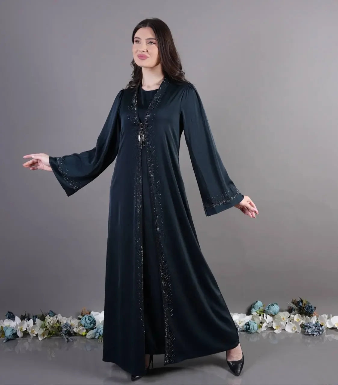 Palestinian Elegance fancy abaya for occasions in black with elegant embellishments and long sleeves