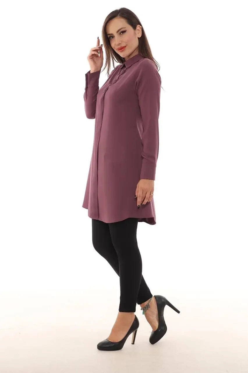 Palestinian Elegance formal tunic for women in mauve paired with black leggings and heels