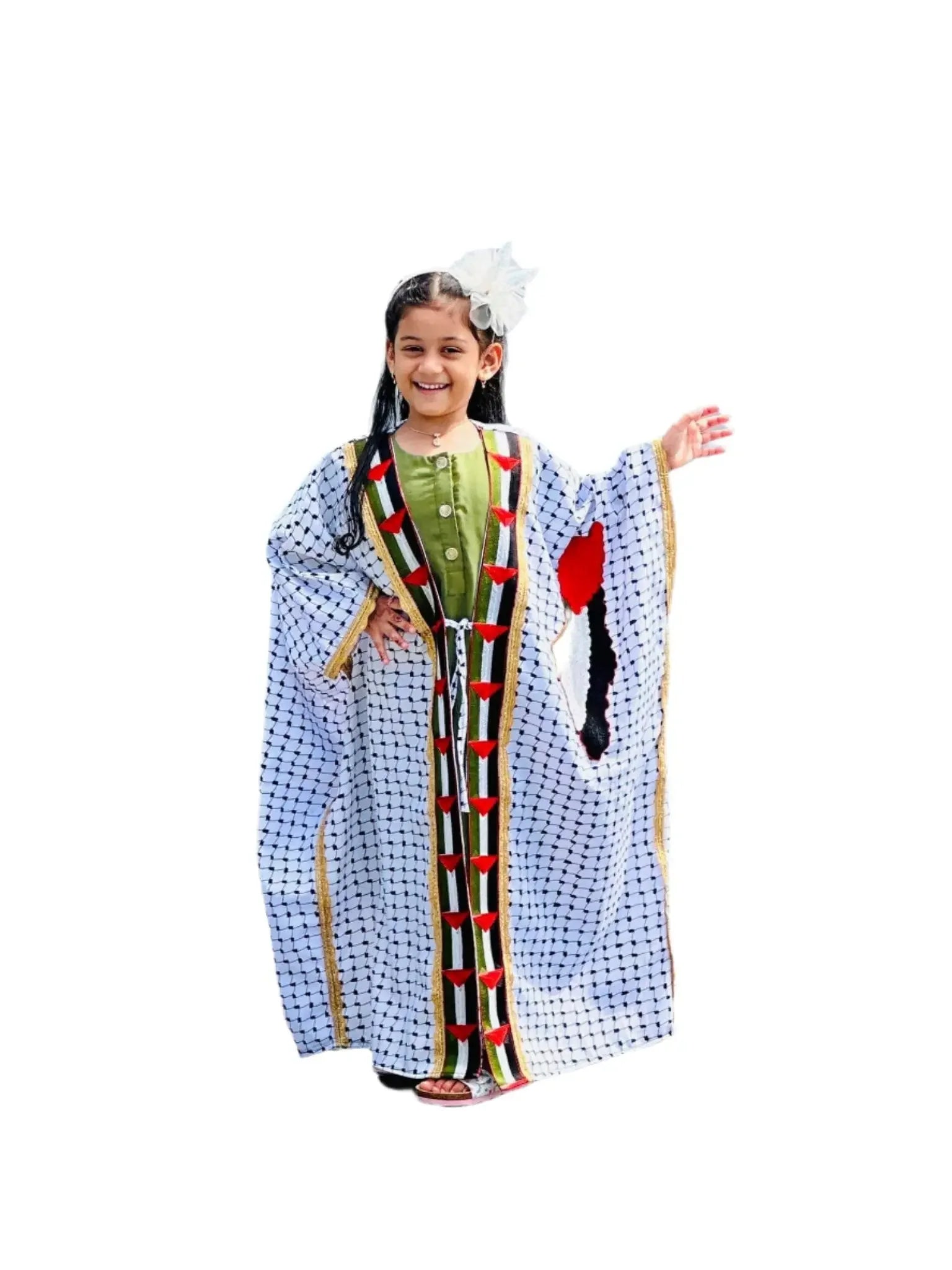 Smiling girl wearing girls kufiya bisht dress with traditional Palestinian embroidery and patterns