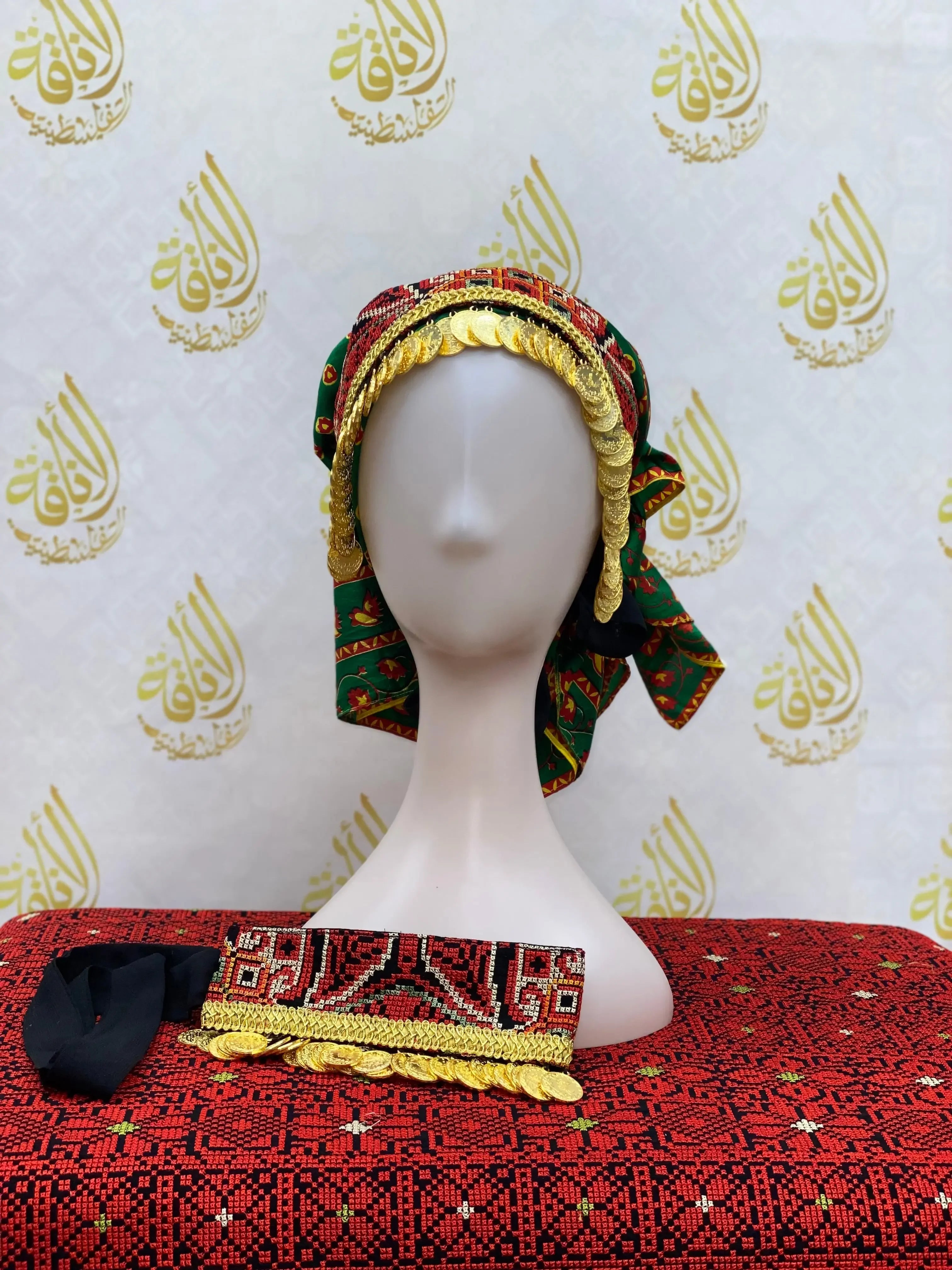 Hand embroidered tatreez headscarf on mannequin with traditional Palestinian Elegance patterns