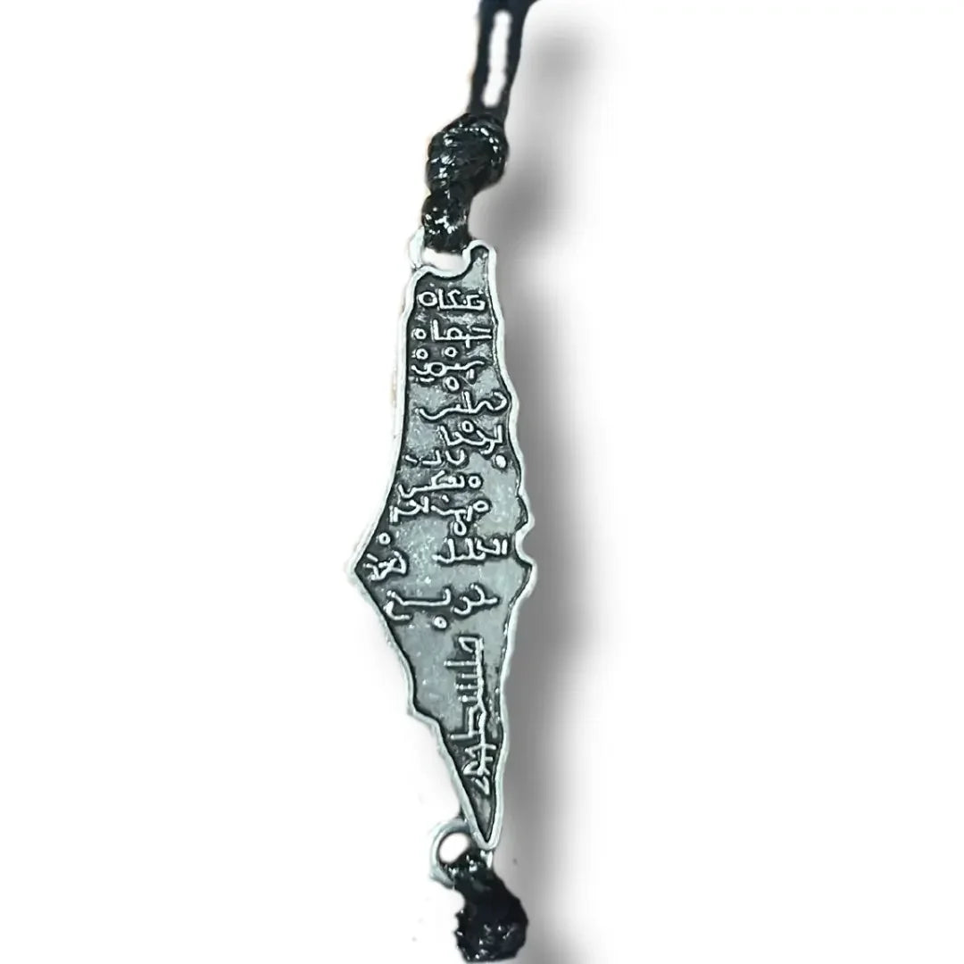 Handcrafted Palestine bracelet by Palestinian Elegance featuring a silver map design with Arabic inscriptions