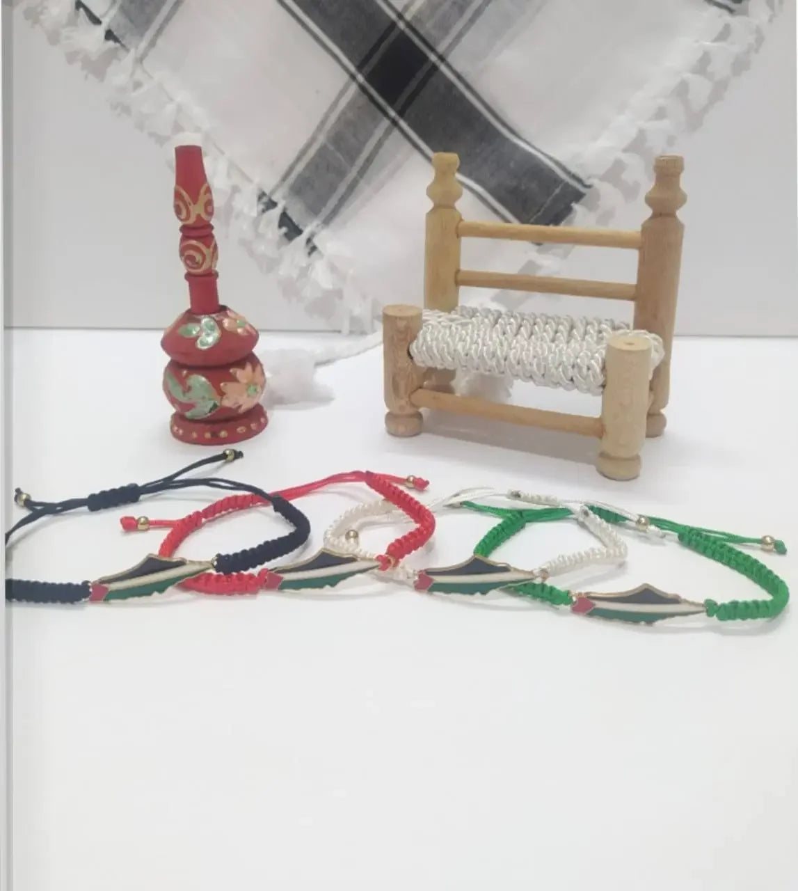 Handcrafted Palestine bracelet in black red white and green with traditional decor accessories