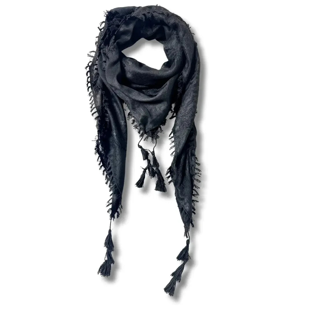 Black handcrafted Palestinian kuffiyeh scarf with tassels from Palestinian Elegance accessories collection