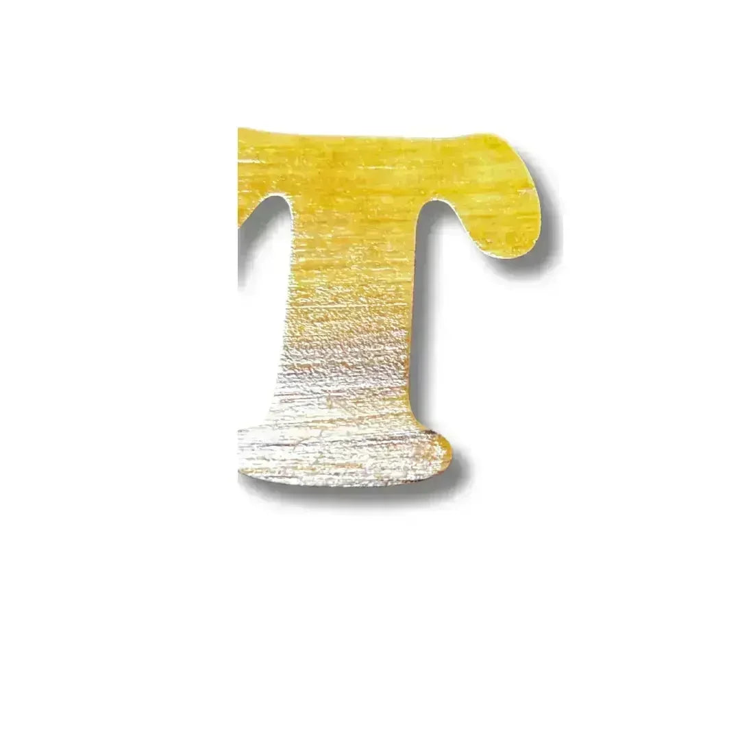 Close-up of wooden letter T from a handmade Arabic love keychain by Palestinian Elegance