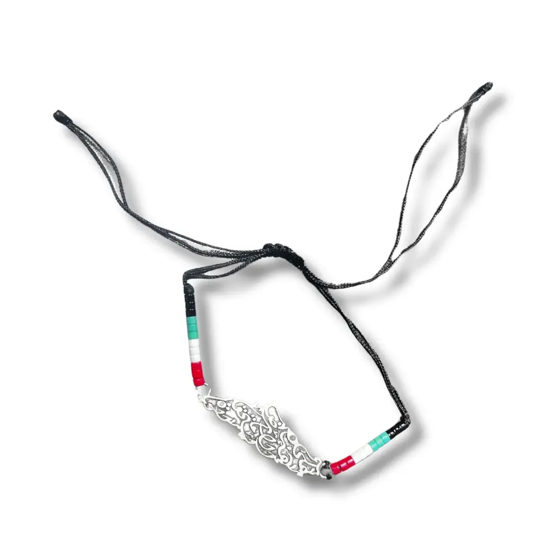 Palestinian Elegance handmade beaded bracelets with intricate silver charm and black adjustable cord
