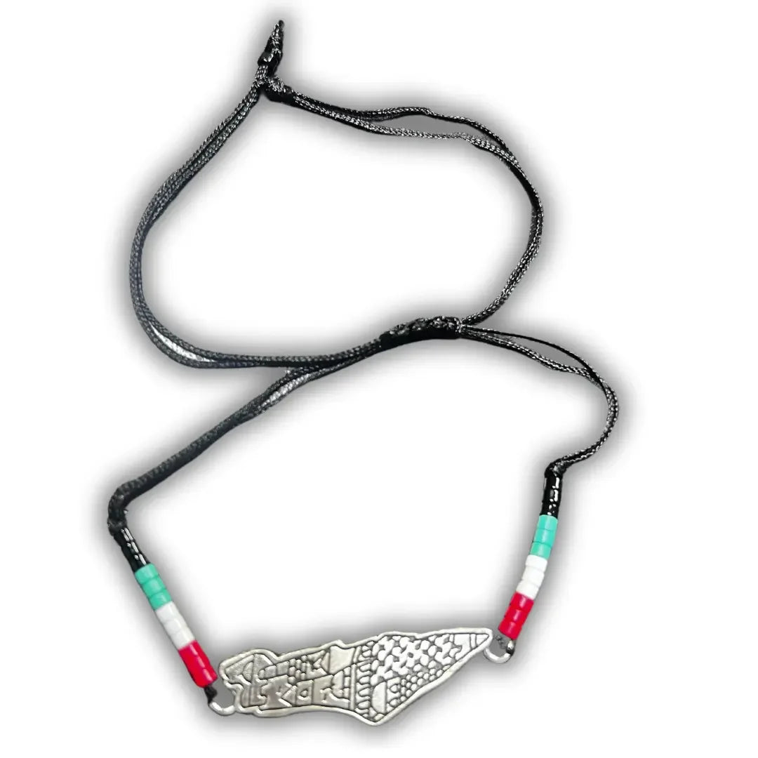 Palestinian Elegance handmade beaded bracelets with black cord and intricate silver centerpiece charm