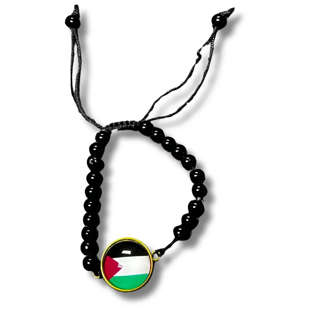 Handmade Palestine bracelet with black beads and a flag charm from Palestinian Elegance accessories