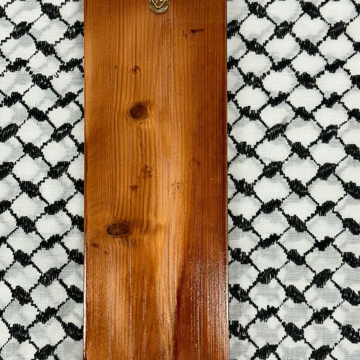 Palestinian Elegance handmade Palestine map wall art wooden base on black and white patterned fabric