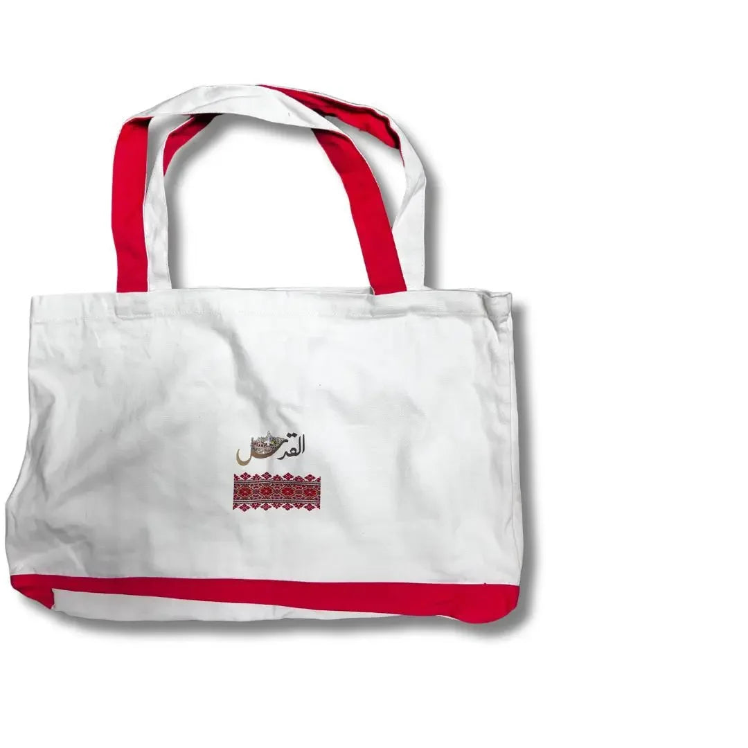 White and red handmade Palestine tote bag with Arabic embroidery and sturdy handles by Palestinian Elegance