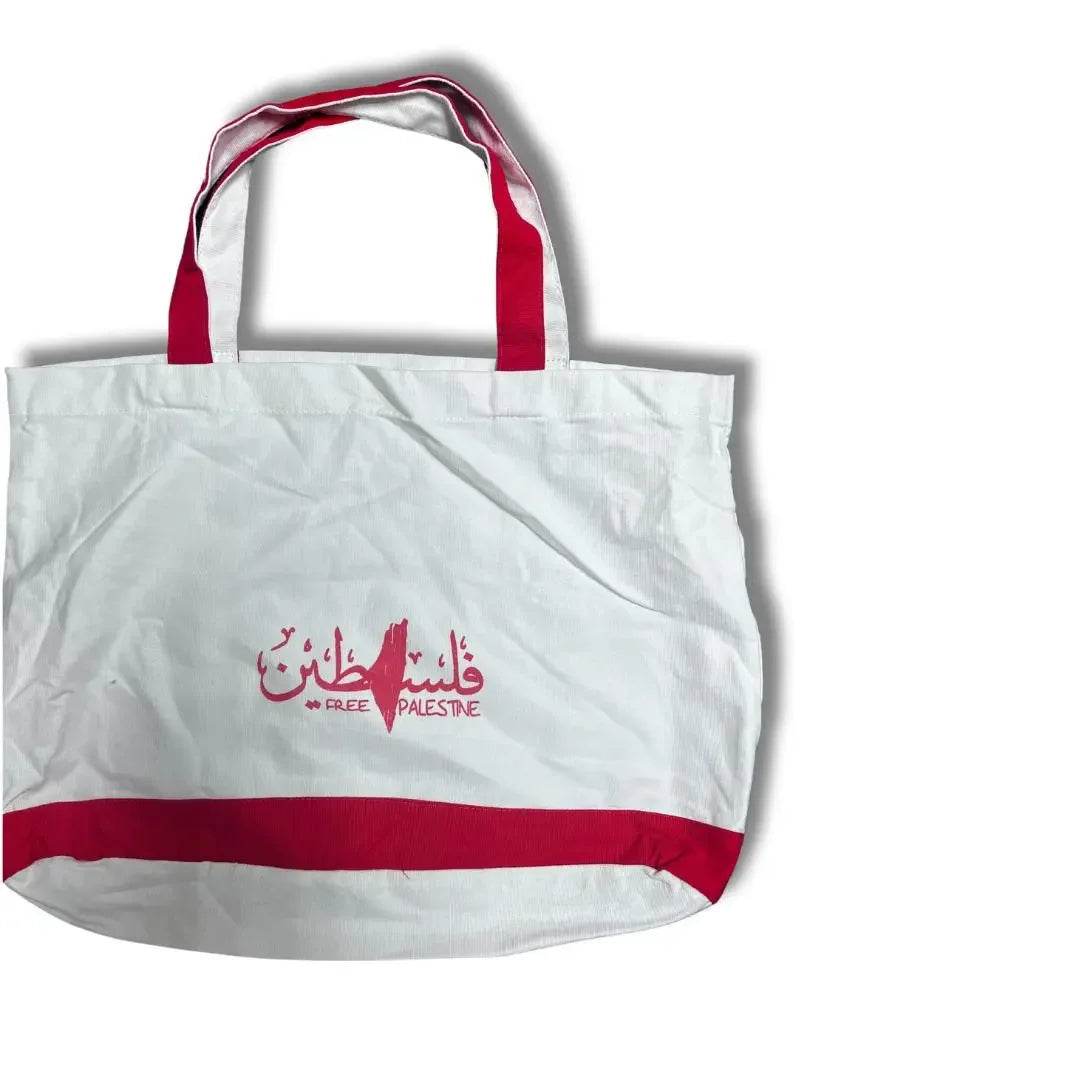 Palestinian Elegance handmade Palestine tote bag in white with red handles and decorative text