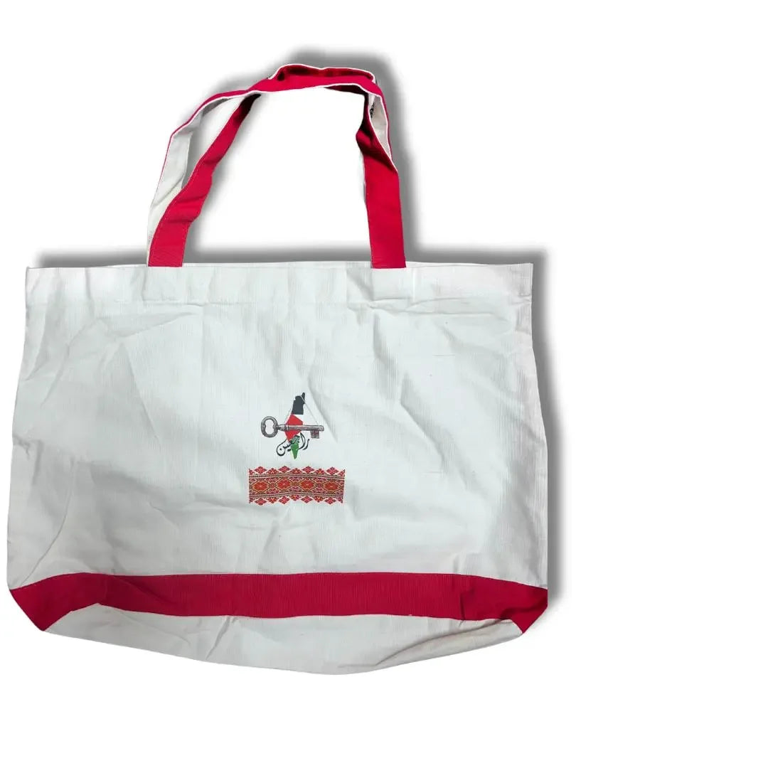 Handmade Palestine tote bag by Palestinian Elegance with red handles and traditional embroidery design