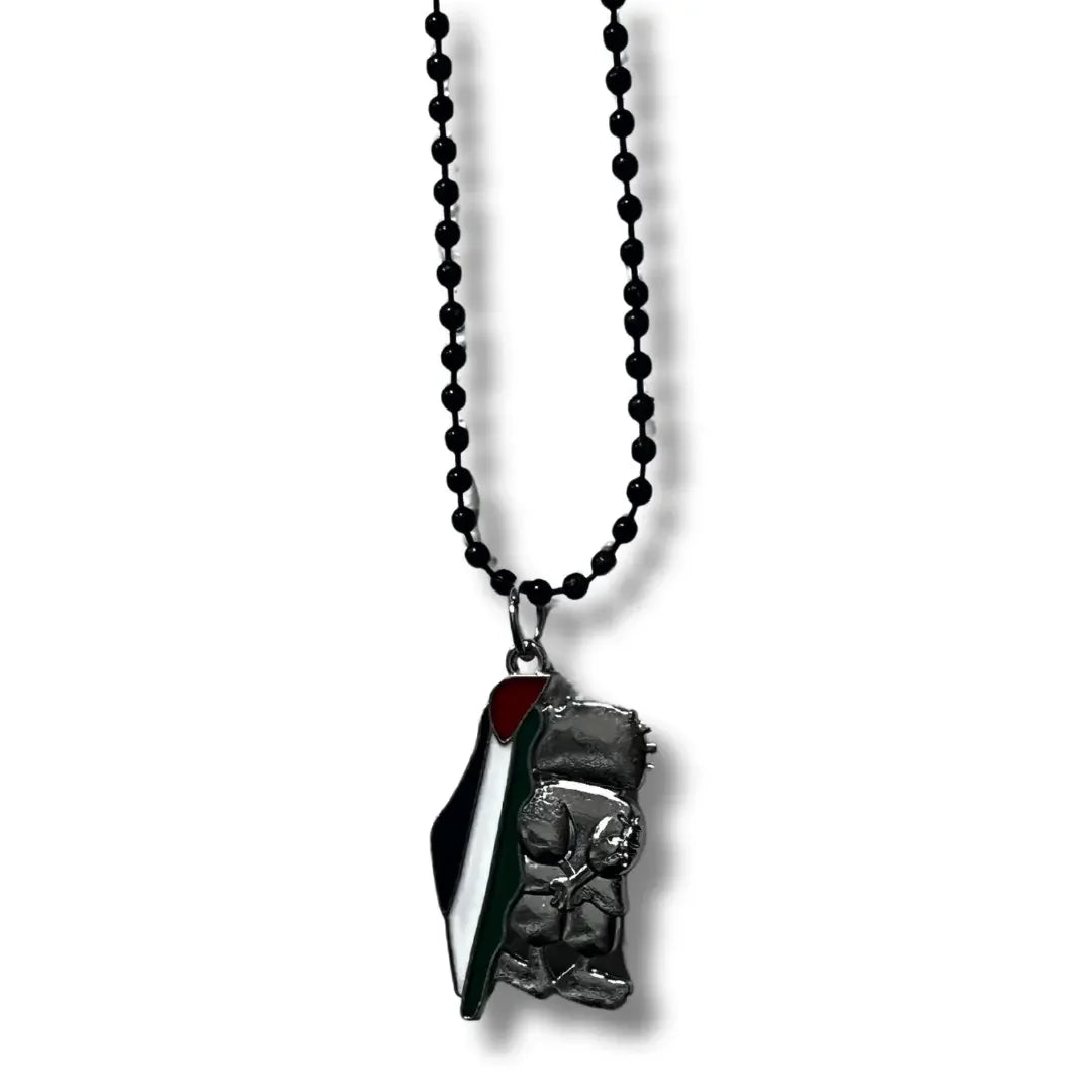 Handmade Palestinian silver necklace with a pendant featuring the Palestinian flag and artistic silver design