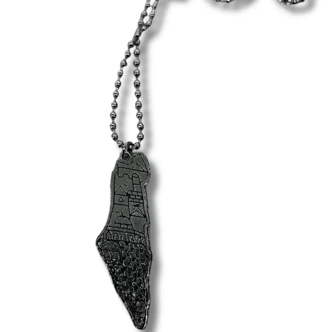 Handmade Palestinian silver necklace featuring a detailed pendant shaped like Palestine map