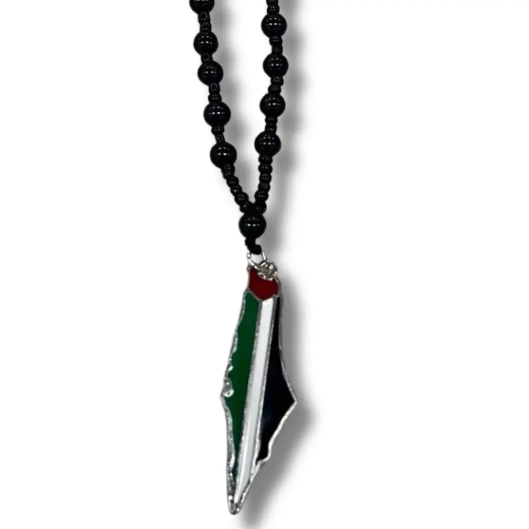 Handmade Palestinian silver necklace with black beads and colorful silver pendant from Palestinian Elegance