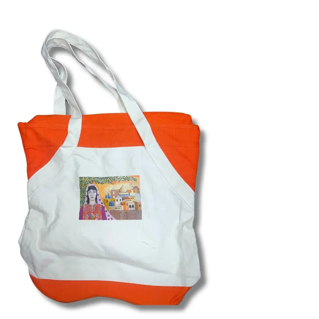 Handmade Palestinian tote bag by Palestinian Elegance with white and orange colors featuring traditional artwork