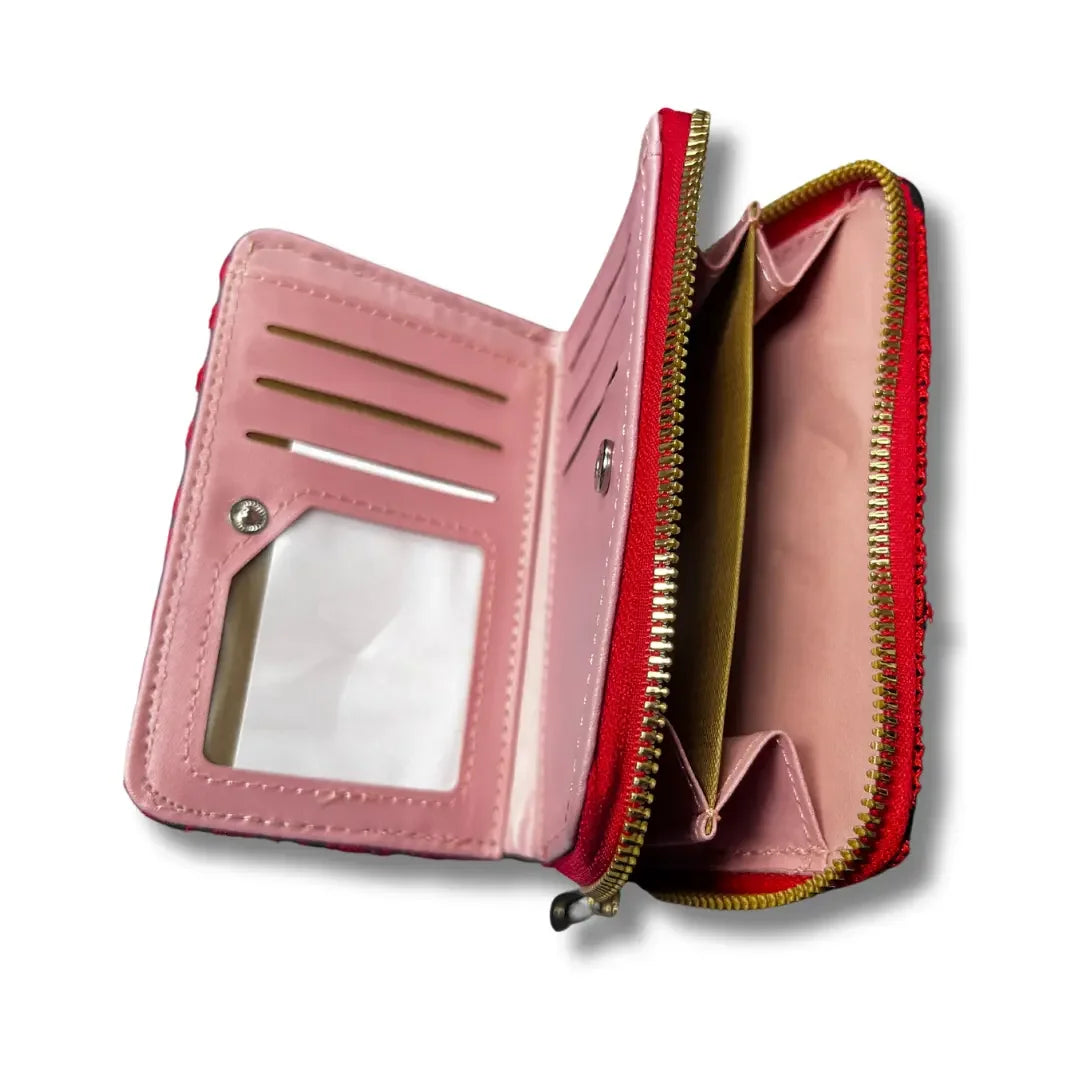 Handmade tatreez wallet by Palestinian Elegance with pink interior and multiple card slots