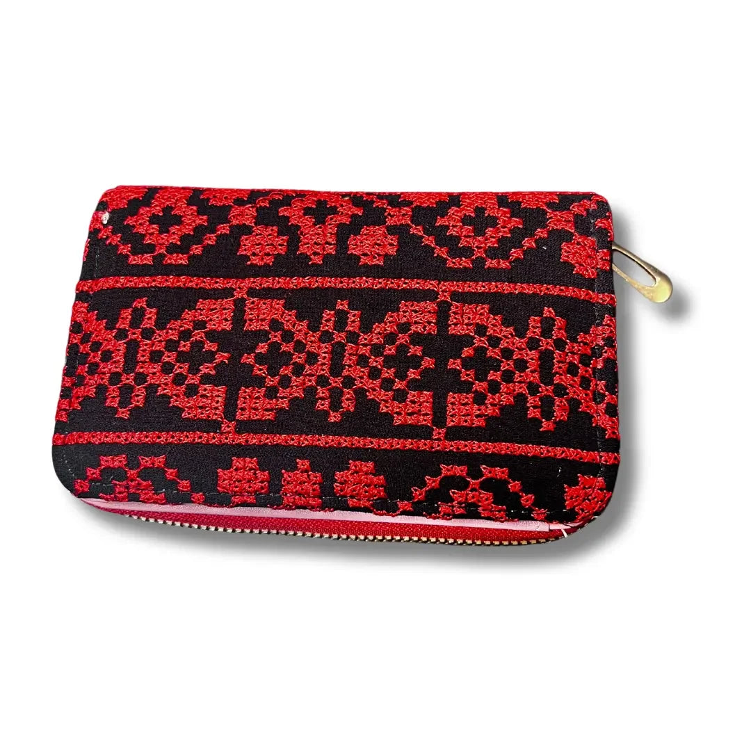 Palestinian Elegance handmade tatreez wallet with red and black intricate embroidery and zipper closure