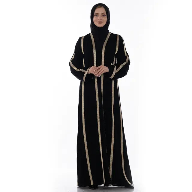 Palestinian Elegance black Khaleeji open abaya with gold vertical stripes worn by a model