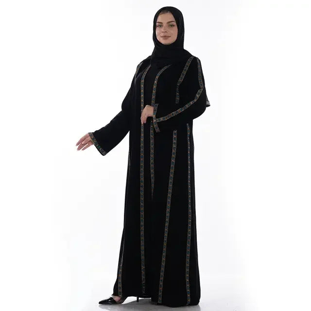 Palestinian Elegance Khaleeji open abaya in black with colorful vertical embroidery worn with black hijab