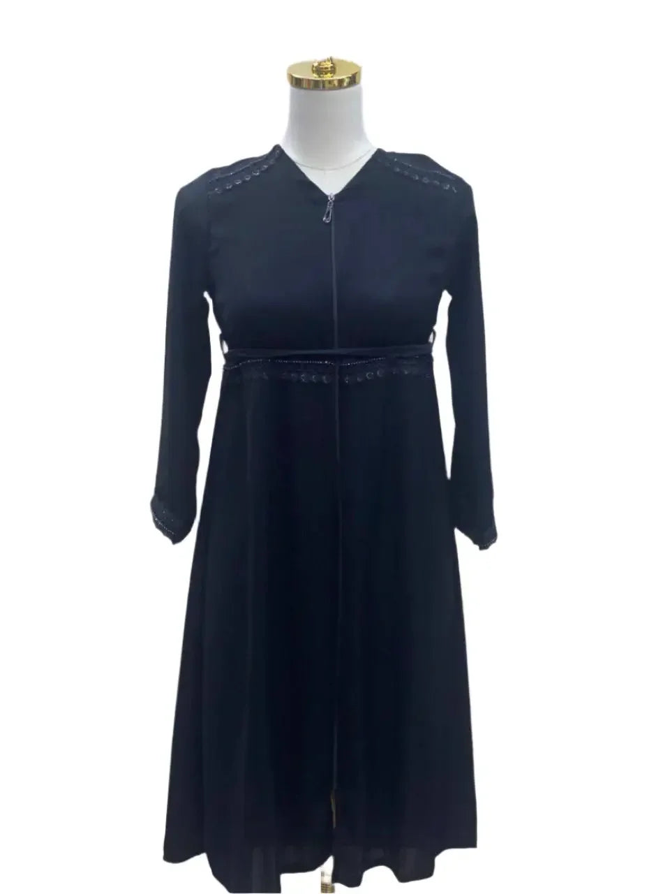 Palestinian Elegance black kids abaya with zipper featuring long sleeves and subtle detailing on shoulders