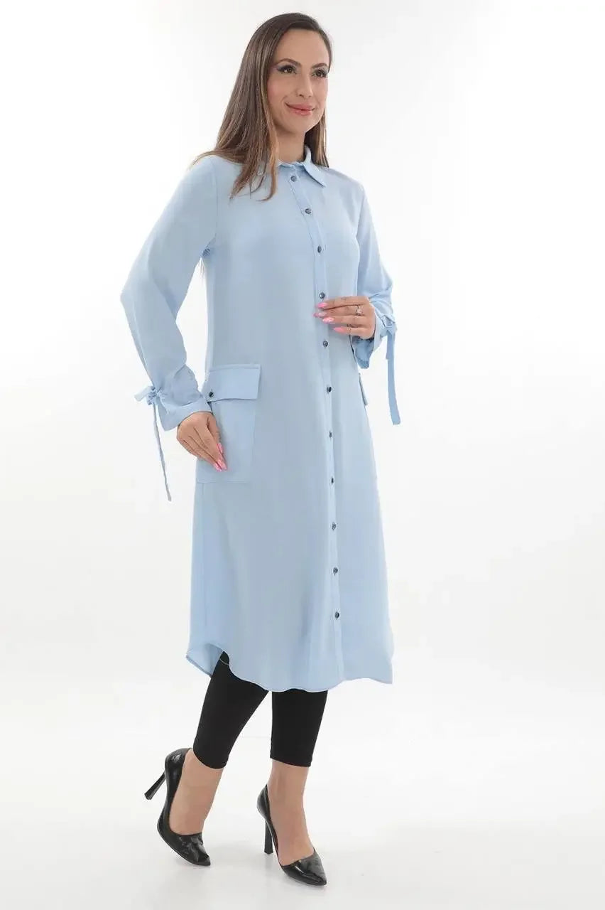 Palestinian Elegance long relaxed tunic for women in light blue with button-down front and side pocket