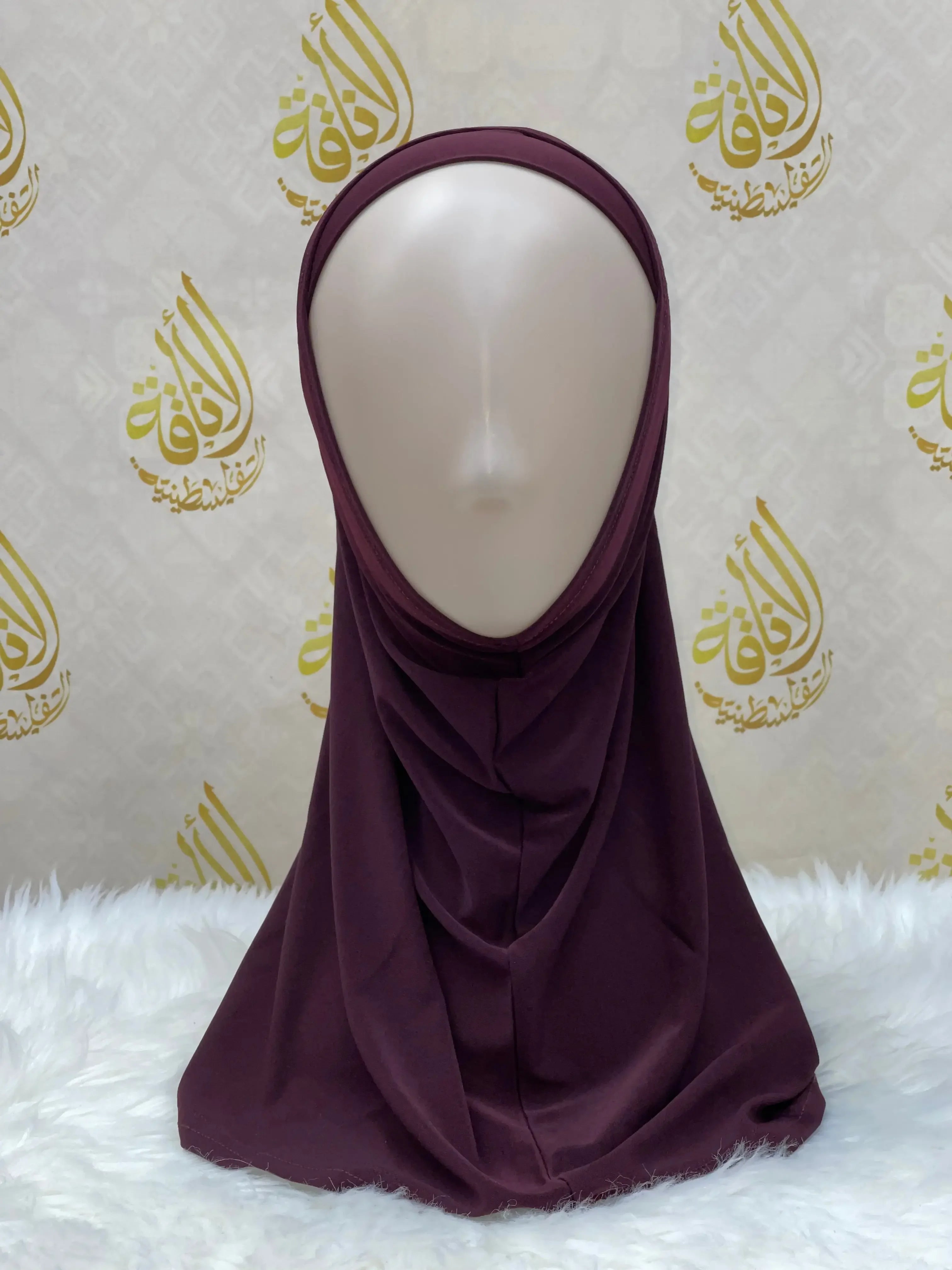Palestinian Elegance lycra hijab for women in deep purple display on mannequin head