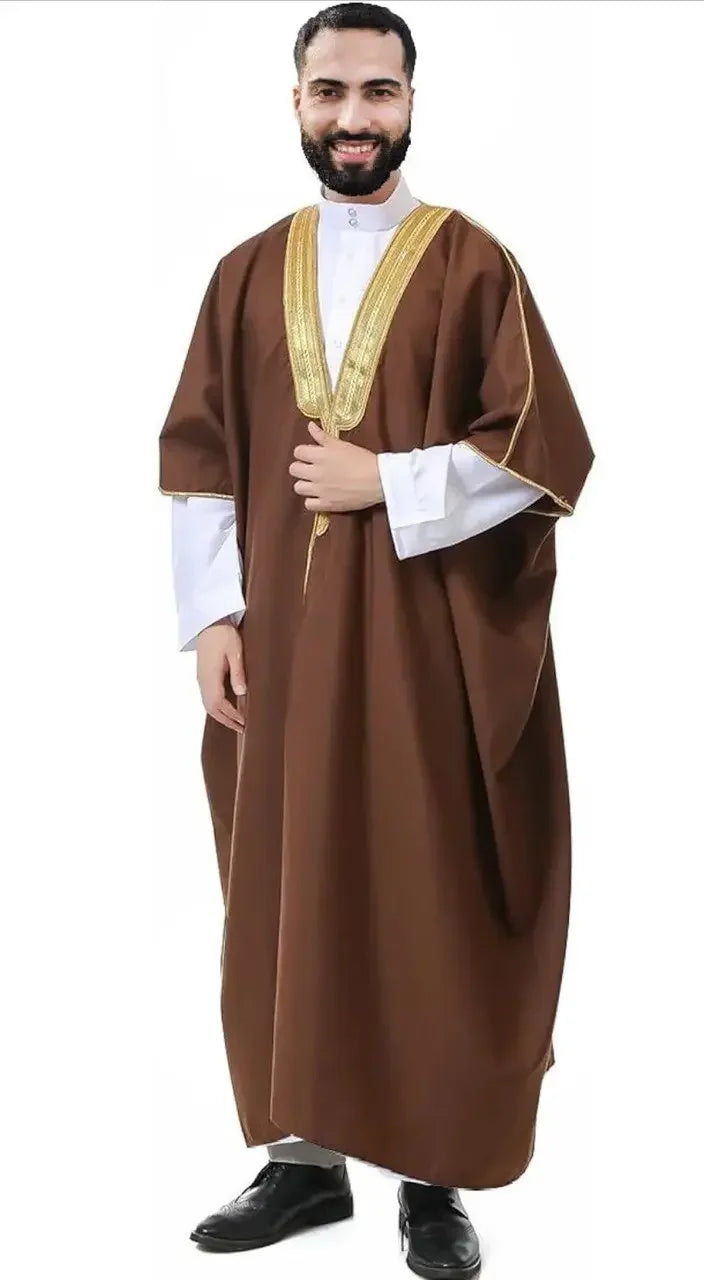 Men's cotton abaya bisht in brown with gold trim worn by a smiling man from Palestinian Elegance