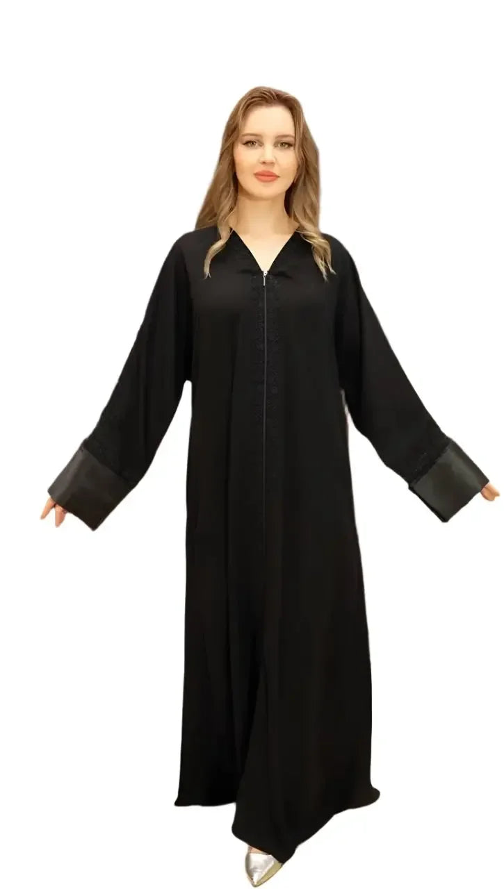 Palestinian Elegance black modern abaya for women with wide leather cuffs and front zipper
