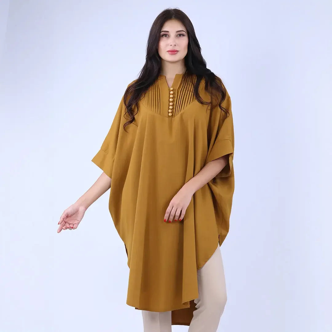 Palestinian Elegance modest cape top in mustard yellow with button details and relaxed fit