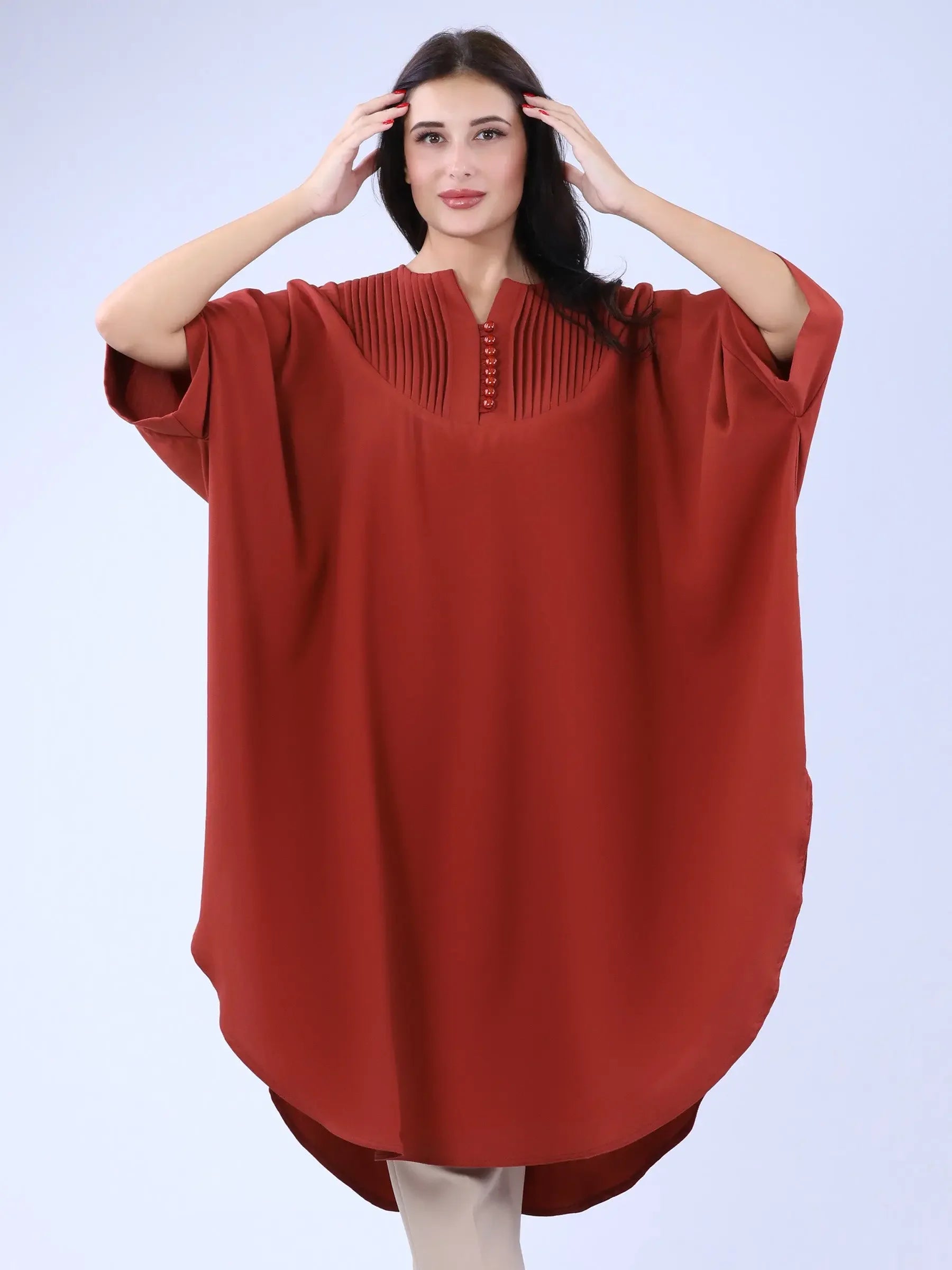 Palestinian Elegance casual modest cape top in rust color with button details on front