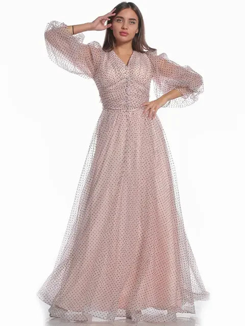 Palestinian Elegance modest dotted dress for women with sheer puff sleeves and long flowing skirt