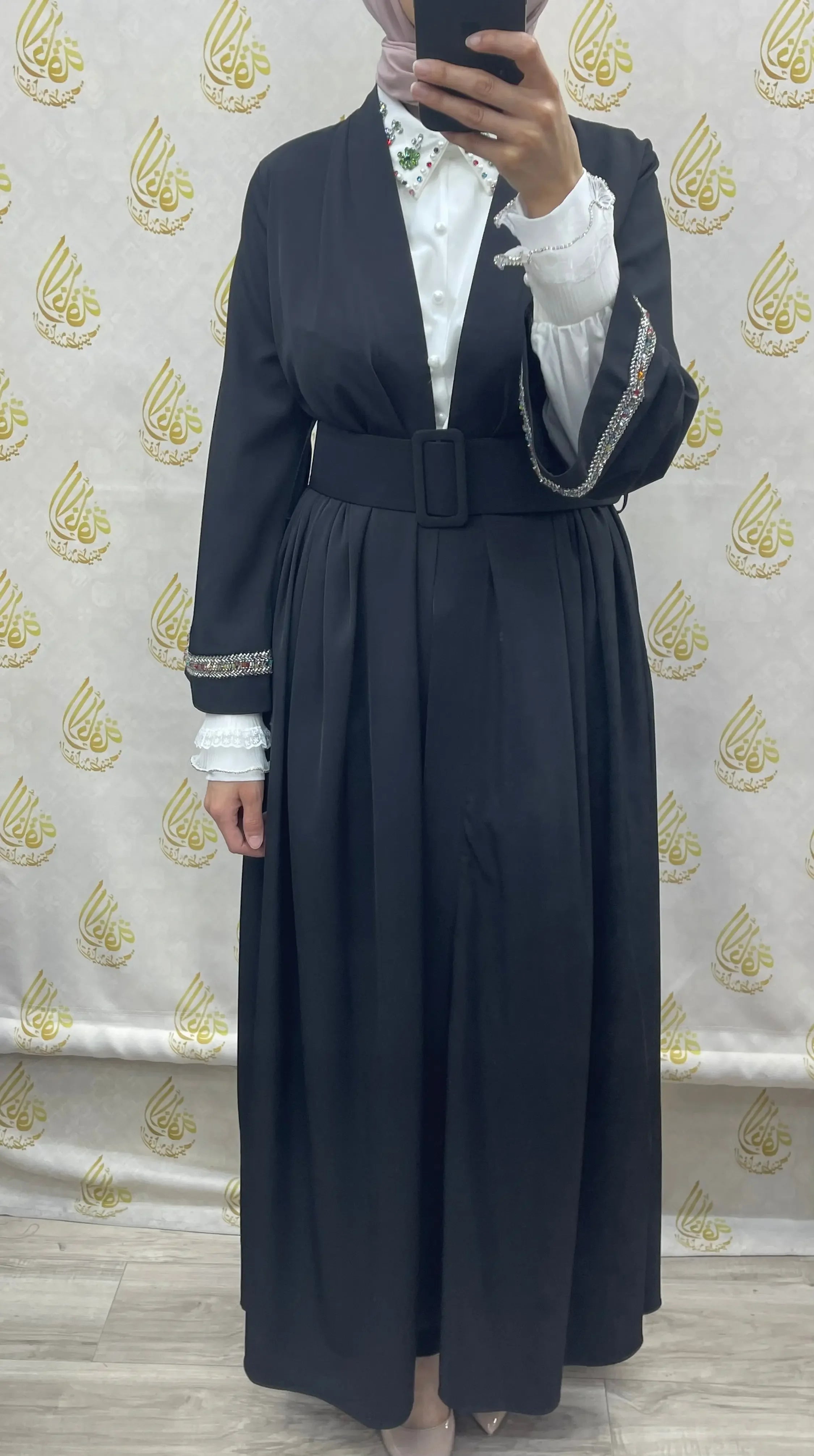 Palestinian Elegance modesty long set in black with belted waist and detailed cuffs over white blouse