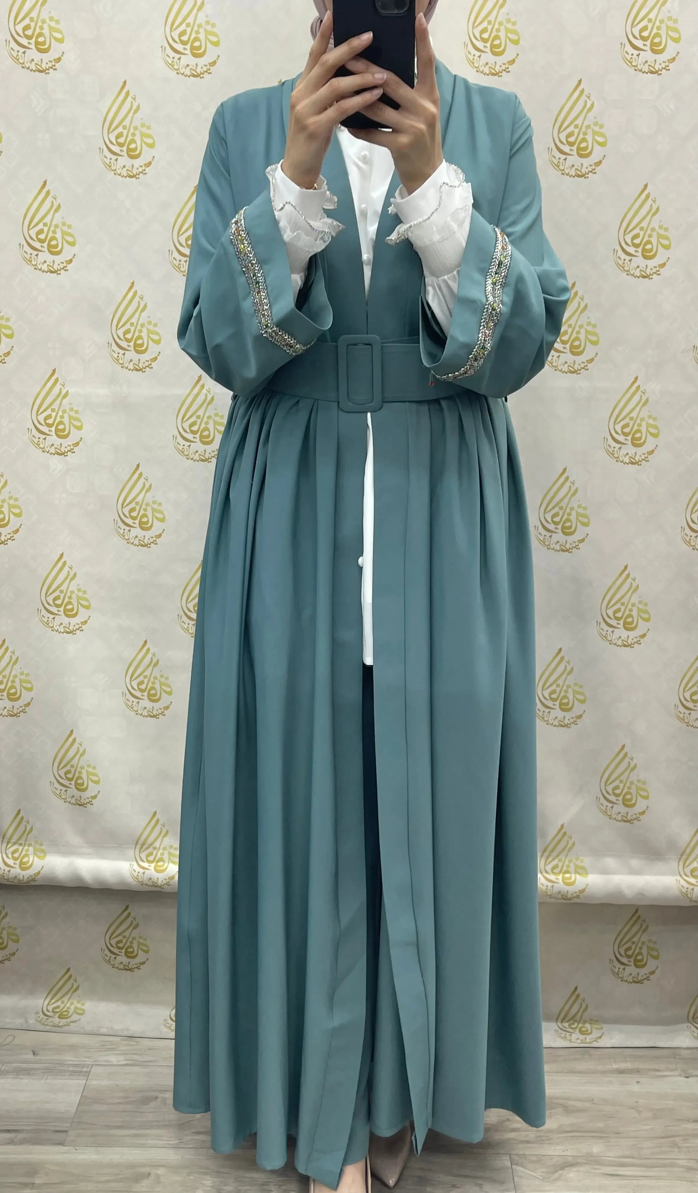 Palestinian Elegance modesty long set in teal with pleated skirt and detailed sleeve cuffs