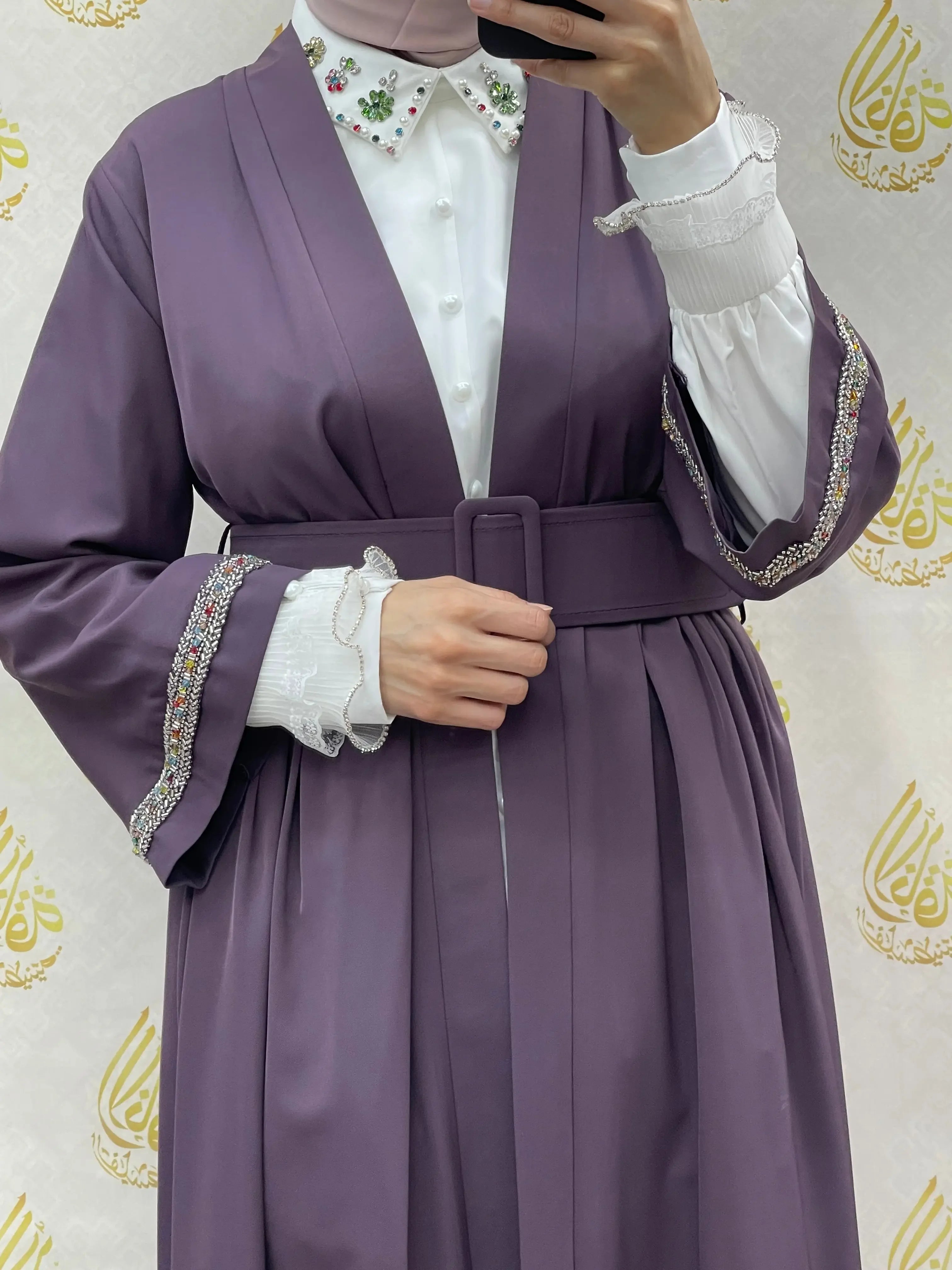 Palestinian Elegance modesty long set in purple with decorative sleeve trim and belted waist