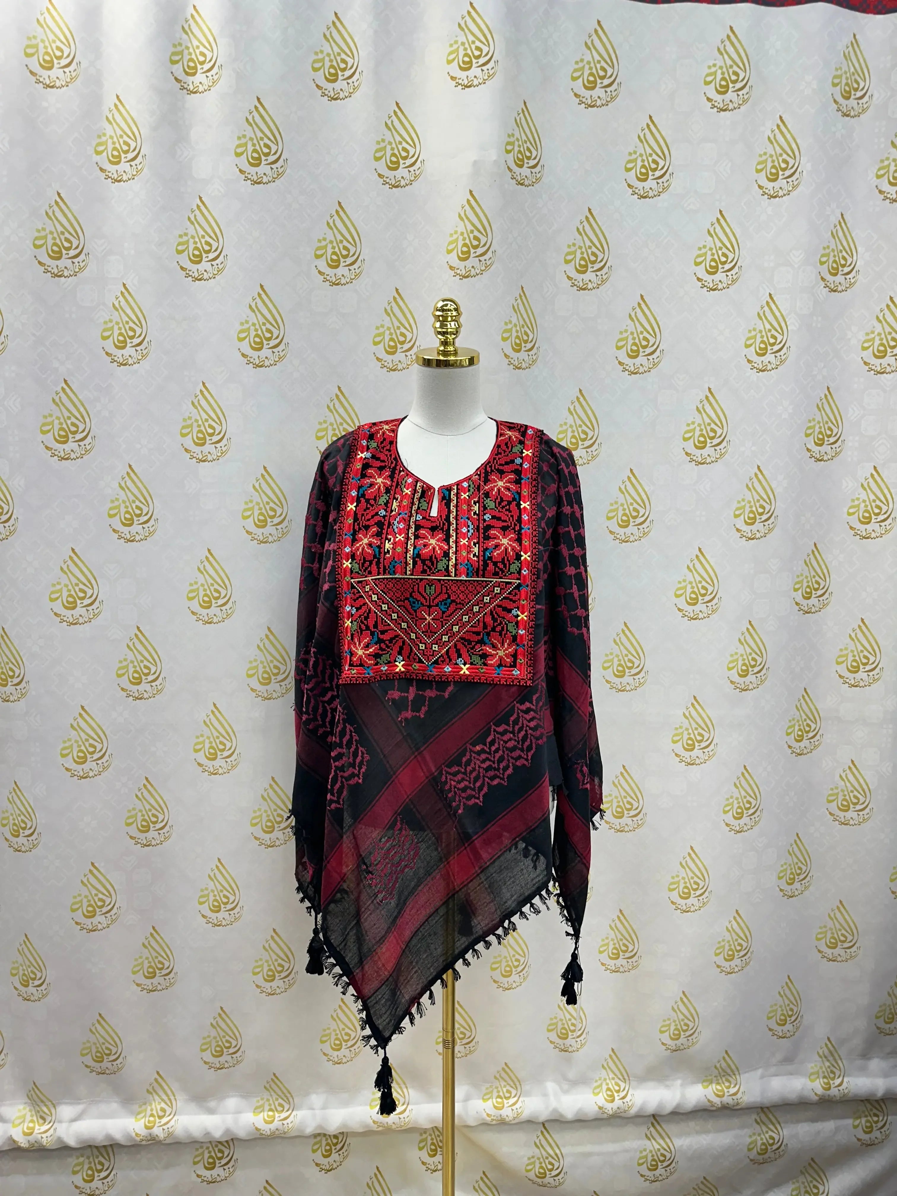Palestinian Elegance multicolor kuffiyeh shirt with intricate embroidery and traditional patterns on a mannequin